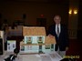 Orren Robbins with the doll house he built and donated to the club auction.